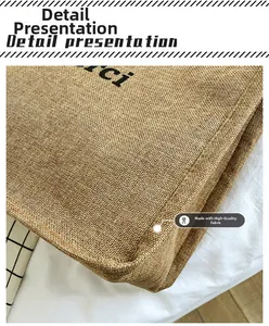 Close-up of the reinforced stitching and woven linen texture on a durable tote bag