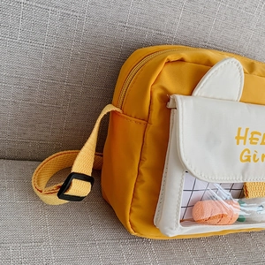 Yellow and white cartoon canvas crossbody bag with cute rabbit ears and carrot plush toy