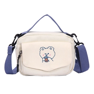 Cute canvas crossbody bag for women with blue straps and cartoon bear embroidery
