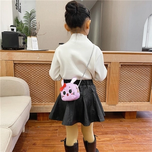 Close-up of child wearing a purple rabbit-shaped PU crossbody bag with silver chain