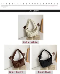 Three large quilted dumpling bags in white, brown, and black displayed together