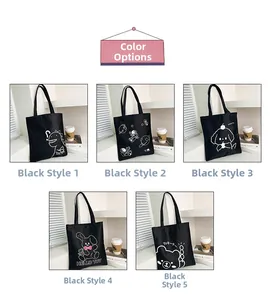 Detailed grid of black canvas tote bags featuring five unique white cartoon prints