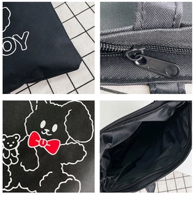 Detail views of black canvas tote featuring cartoon prints, zippers, and interior lining