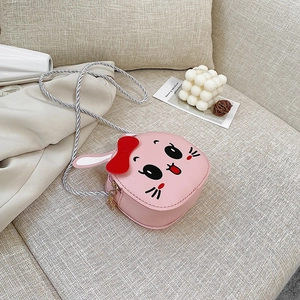 Pink cartoon bunny crossbody bag for kids with cute rabbit ears and a red bow decoration