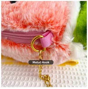 Detail of a plush watermelon bag showing high-quality gold hardware hooks and chain strap