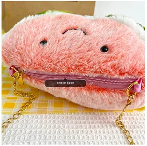 Close-up of the smooth metal zipper on the plush watermelon crossbody bag for girls