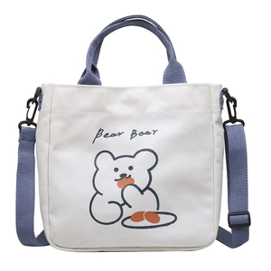 Canvas bear print tote bag with adjustable shoulder strap and blue handles for women