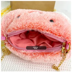 Detailed interior view of pink plush crossbody bag with silk lining and gold chain strap