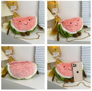 Mini plush watermelon crossbody bag showing size comparison with a smartphone
