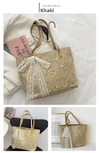 Detailed straw tote bag with pink flower embroidery and white lace ribbon bow accent