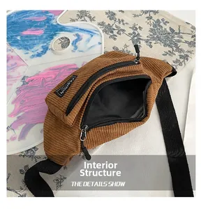 Internal structure of brown corduroy chest bag showing zipper pocket and spacious interior