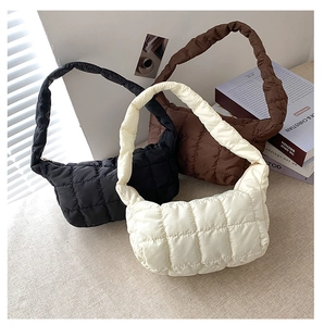 Detail view showing quilted puffer shoulder bags in black, brown, and beige colors