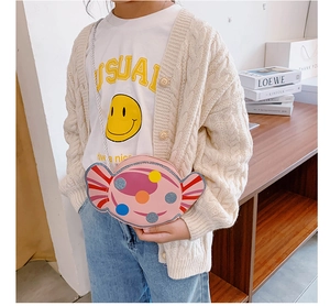 Sac à bandoulière rose en forme de bonbon pour fille avec pois colorés et paillettes
