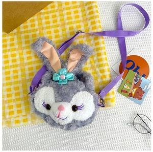 Close-up of StellaLou style plush crossbody bag with purple faux fur and long rabbit ears