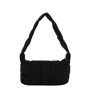 Minimalist black quilted puffer underarm bag with diagonal stitch pattern and zipper