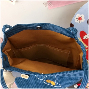 Blue corduroy shoulder bag with magnetic closure and soft lining for women