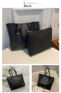 Detailed views of black matte faux leather tote bag set with adjustable gold buckle