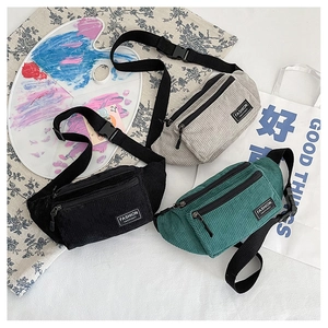 Detailed corduroy texture and dual zipper design on colorful sporty waist bags