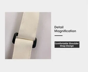 Gros plan détaillé d'une bandoulière en sergé blanc avec boucle de réglage noire