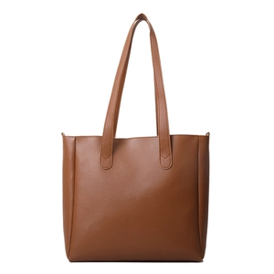 Minimalist dark brown soft leather tote bag for women with dual top handles on white background