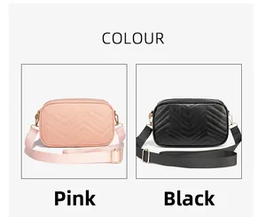Detail of pink and black crossbody camera bags with V-quilted pattern and nylon straps