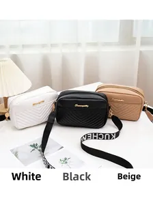 Chic quilted camera bags in white, black and apricot with wide woven shoulder straps