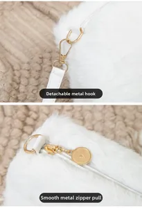 Détail des crochets en métal doré et fermeture éclair sur un sac en peluche blanc