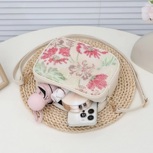 Borsa fotografica chic con paillettes floreali bianco crema e spazio interno