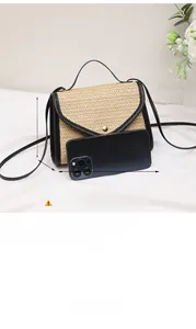 Beige woven crossbody bag with pearl detail and smartphone for size scale reference