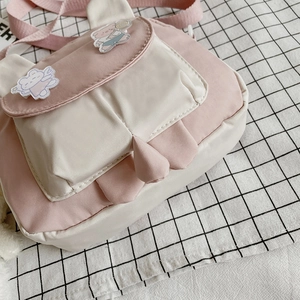 Cute pink and white cartoon rabbit ear crossbody bag with teddy bear patch for women