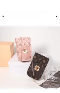 Vertical floral chain phone bag with vintage pattern and golden metal flip lock detail