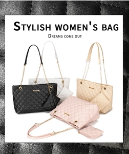 Detail view of quilted tote bag with golden chain straps and small matching coin purse