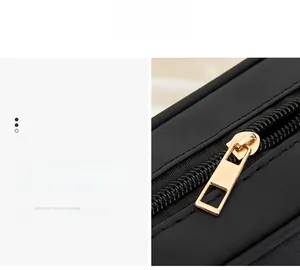 Close-up of premium light gold metal zipper on black crossbody bag with textured fabric