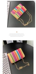 Detail of colorful rainbow woven fabric on the small square bag with golden turn-lock