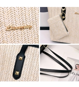 Detail of beige straw tote bag featuring black leather handles and a gold Sunnycity logo