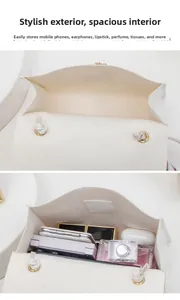Detail view of the white quilted crossbody bag interior capacity with magnetic closure