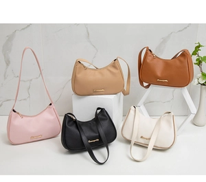 Detailed macro of pebble leather hobo bags in five colors with gold hardware
