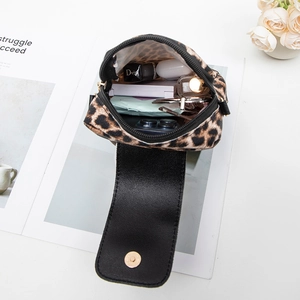 Retro leopard print crossbody phone bag with gold clasp and daily essentials inside