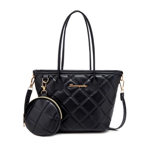 Black quilted tote bag with matching round coin purse and gold chain strap detail