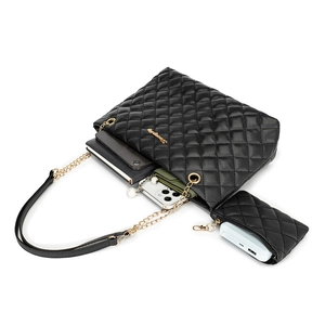 Quilted chain tote bag set with spacious interior for essentials and matching coin purse