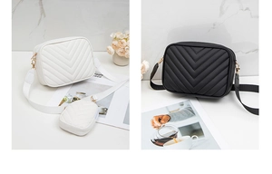 Close-up of ivory and black V-quilted camera bags with detachable coin pouch and wide straps