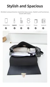 Vue de dessus du sac sous l'aisselle noir montrant un grand intérieur bien organisé