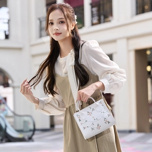 Elegant white square handbag with pink floral embroidery and top handle for women