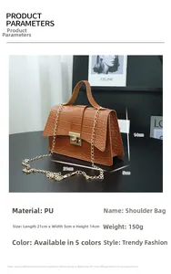 Detail of a brown crocodile pattern PU handbag with golden chain strap and lock, 21x5x14cm