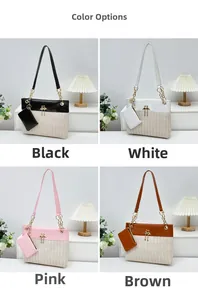 Detailansicht der gewebten Schultertaschen in Schwarz, Weiß, Rosa und Braun mit Sub-Bags