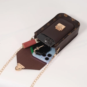 Vintage floral crossbody phone bag with gold chain strap and spacious internal storage