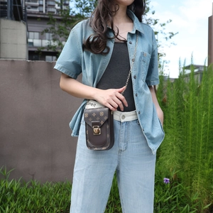 Vintage patterned mobile phone crossbody bag with gold chain strap in brown floral leather