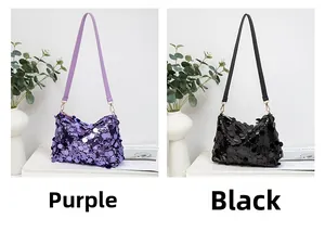 Detail of purple and black sequined shoulder bags with metallic hooks and slim straps