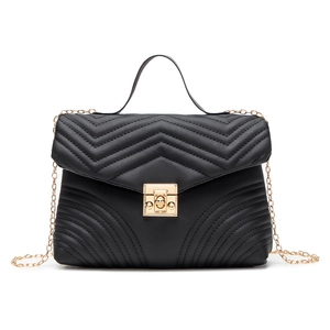 Chic black chevron quilted handbag with gold chain strap and metallic buckle