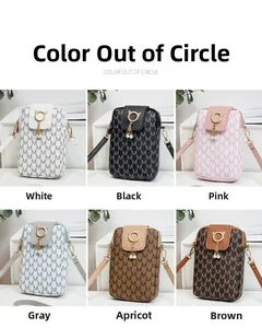 Detail of multi-color monogram phone bags with pearl tassels and cat ear gold rings
